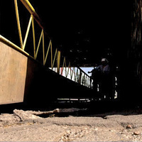 Чи можливий ремонт і облаштування пішохідної зони під залізничним мостом на Рокитне?